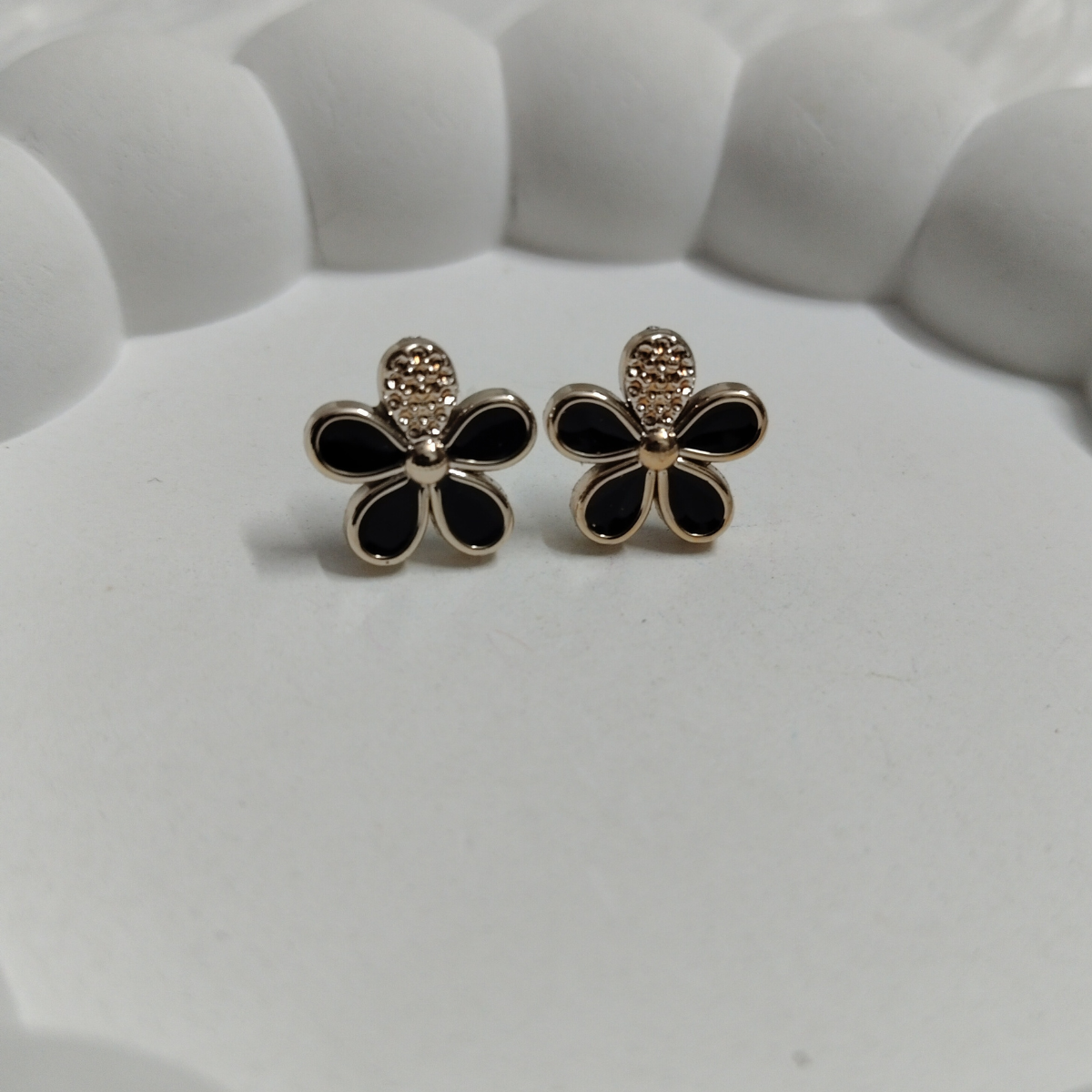 Flower-1.png Black Flower Stud Earrings – Gold-Tone Petals with Enamel Finish - Image 1