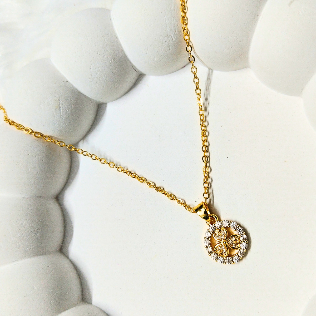 Flower-chain-e1745565991700.png Gold Flower Pendant Necklace with Crystal - Image 1
