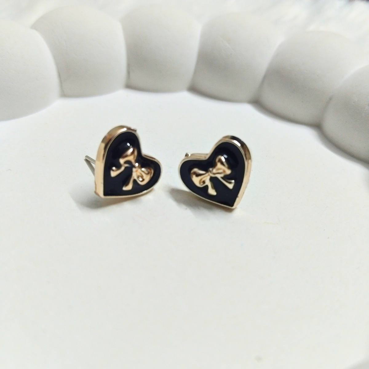 Heart-Bow.png Black Heart Stud Earrings with Gold Bow - Image 1