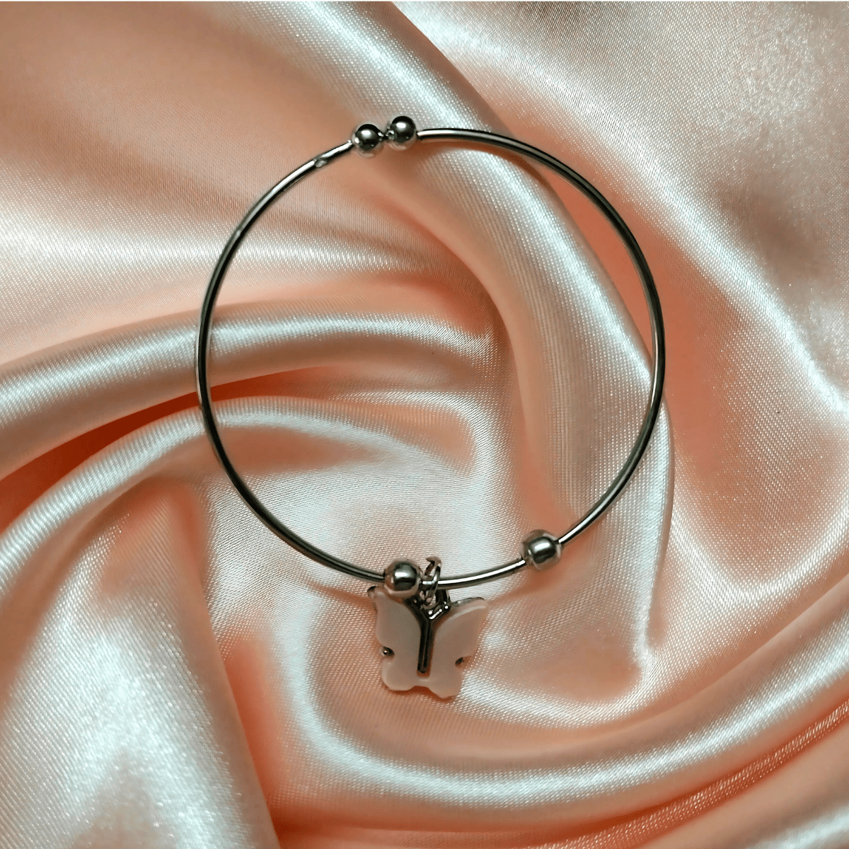 Peach.png Bangle Bracelet with Peach Butterfly Charm - Image 1